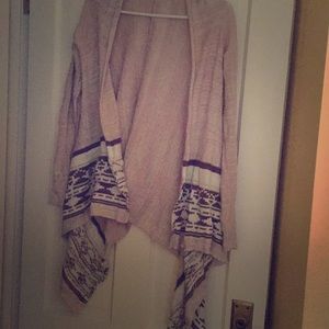 A sweater to go over a shirt or tank top